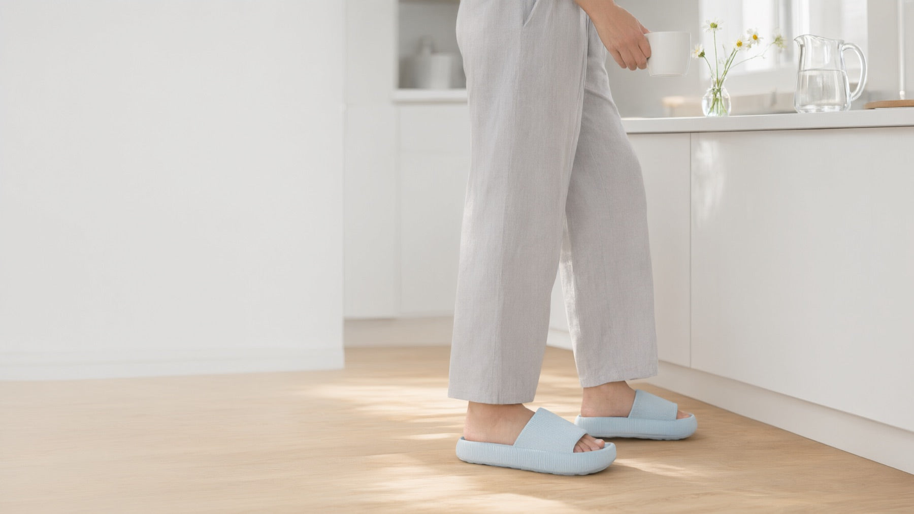 Baby Blue Puffy Slides in a sunny kitchen with morning coffee